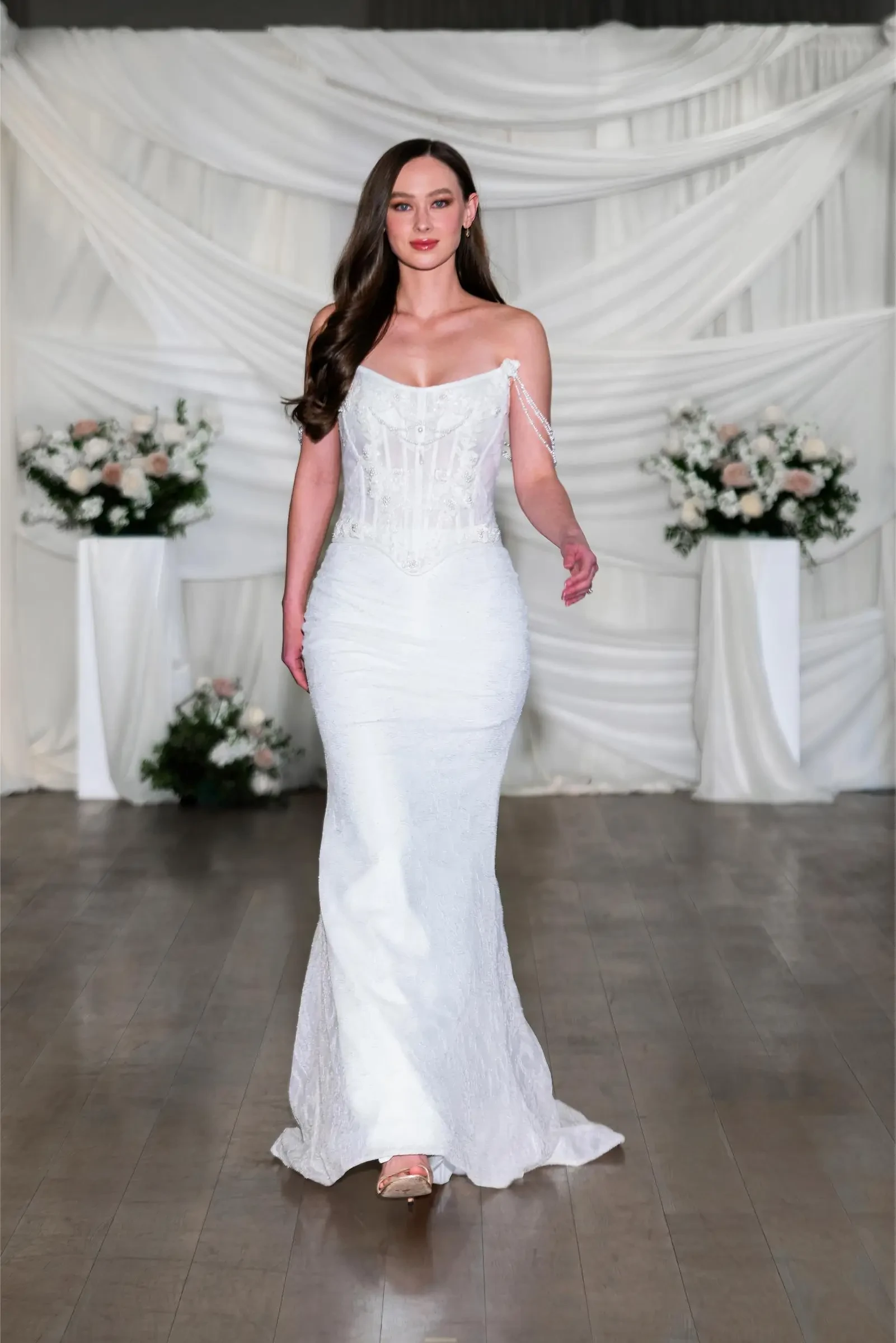 model wearing an elizabeth lee wedding gown