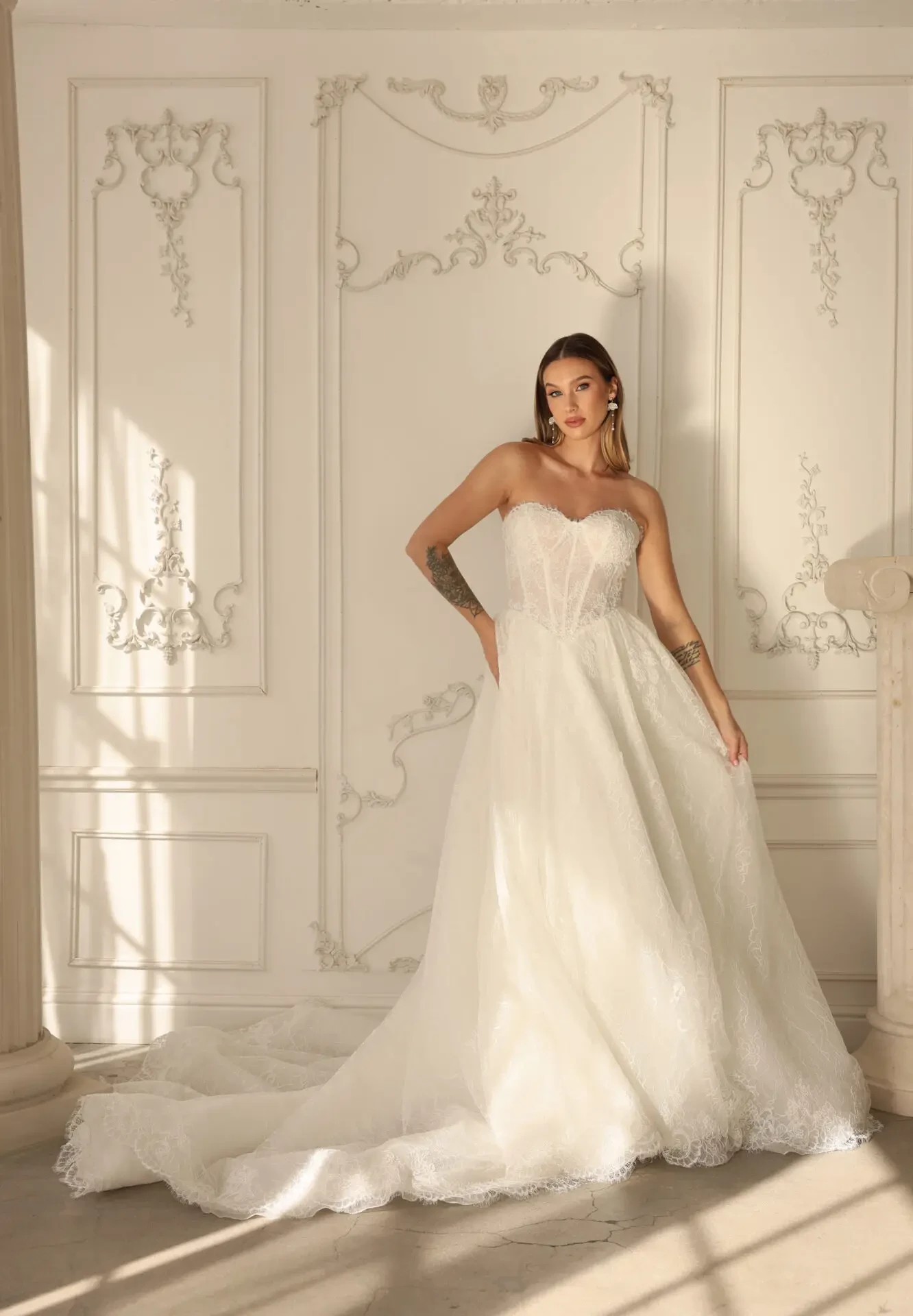 model wearing Madi Lane wedding gown