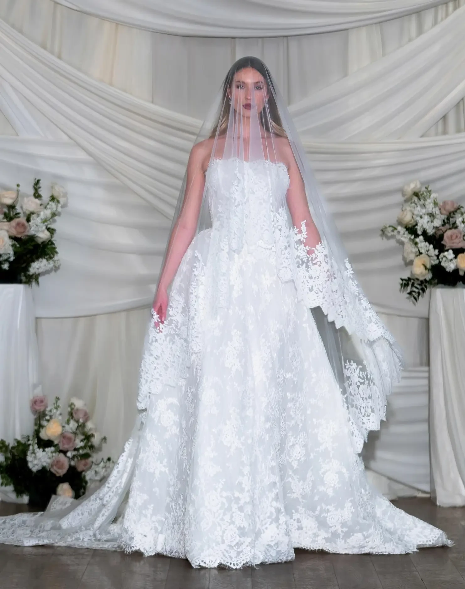 model wearing an elizabeth lee wedding gown