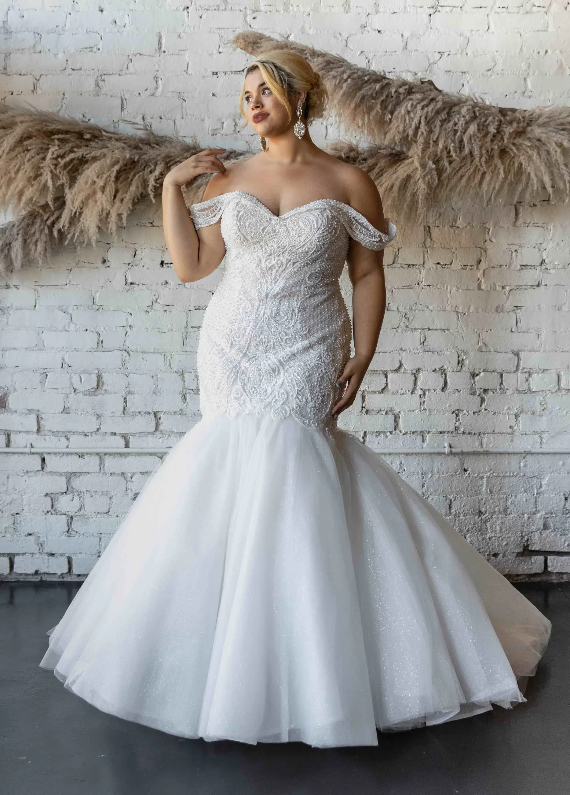 model wearing an elizabeth lee wedding gown