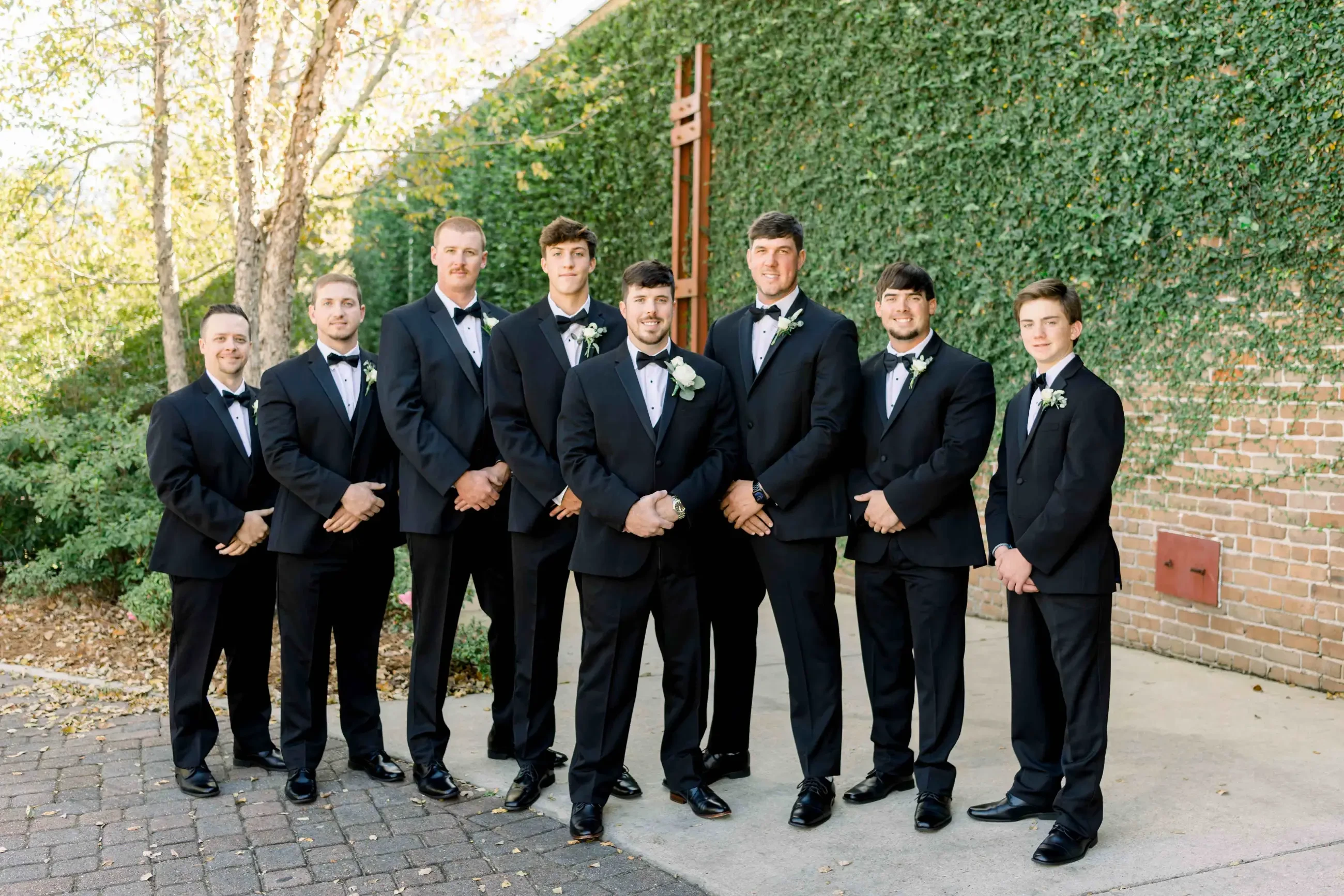 men wearing tuxedos