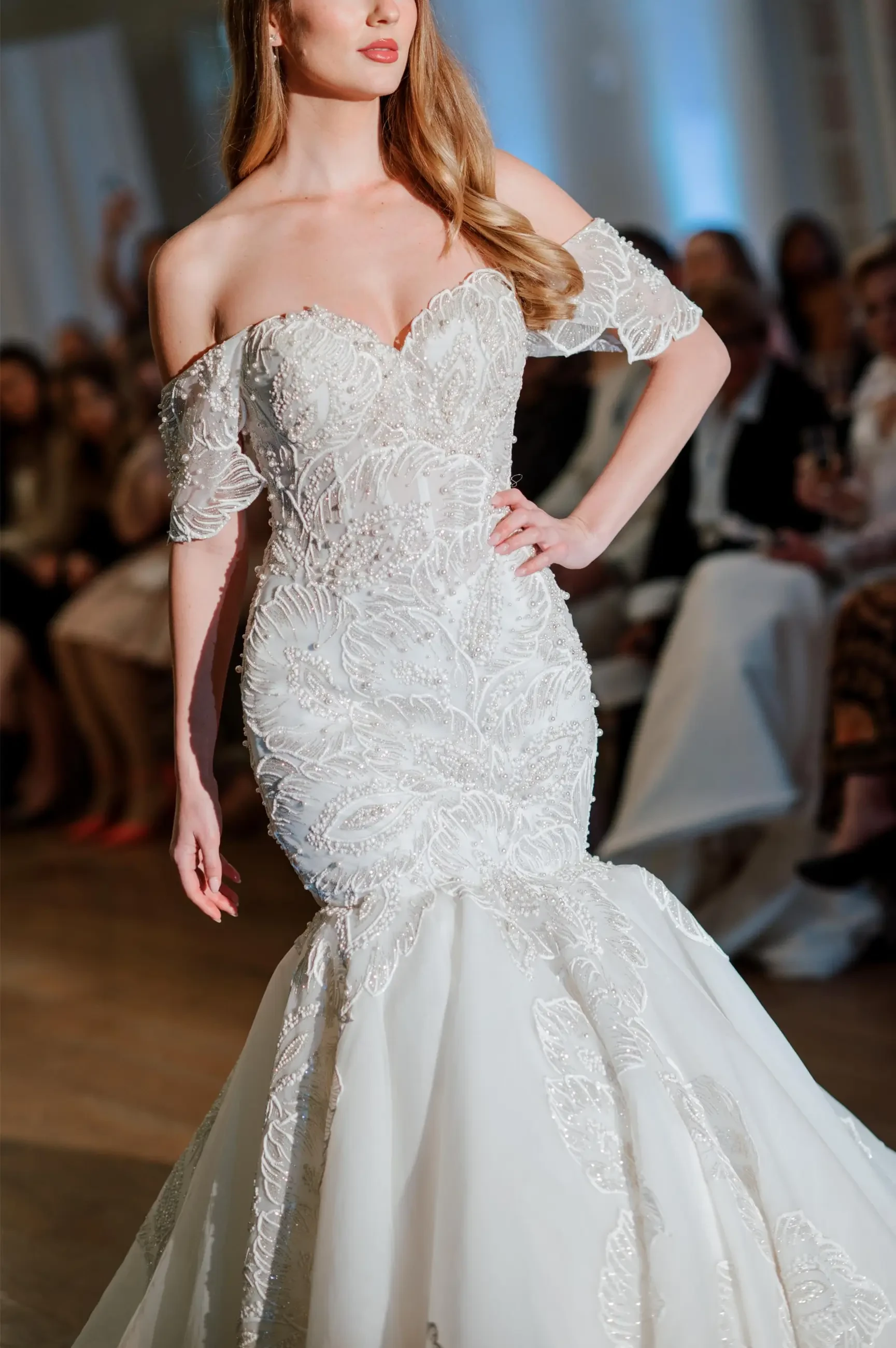model wearing an elizabeth lee wedding gown