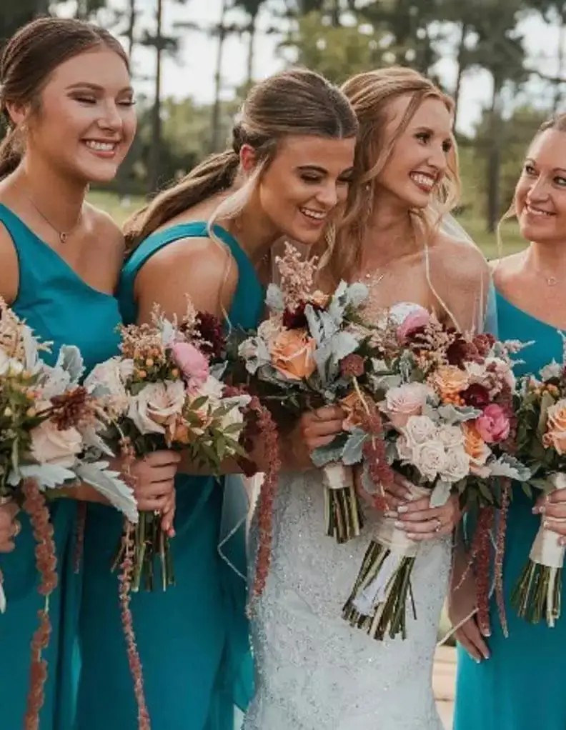 Models wearing a blue dresses