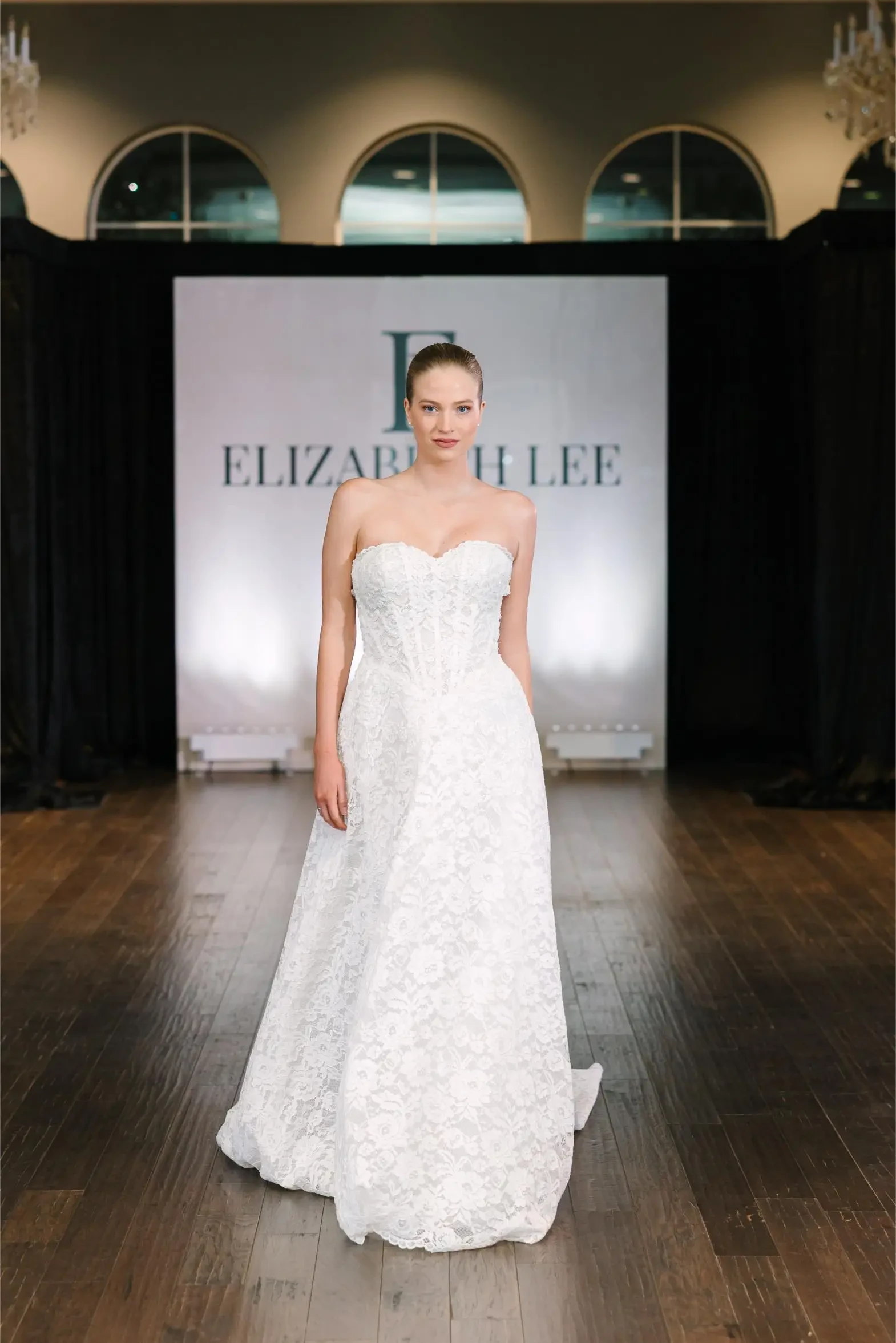 model wearing an elizabeth lee wedding gown