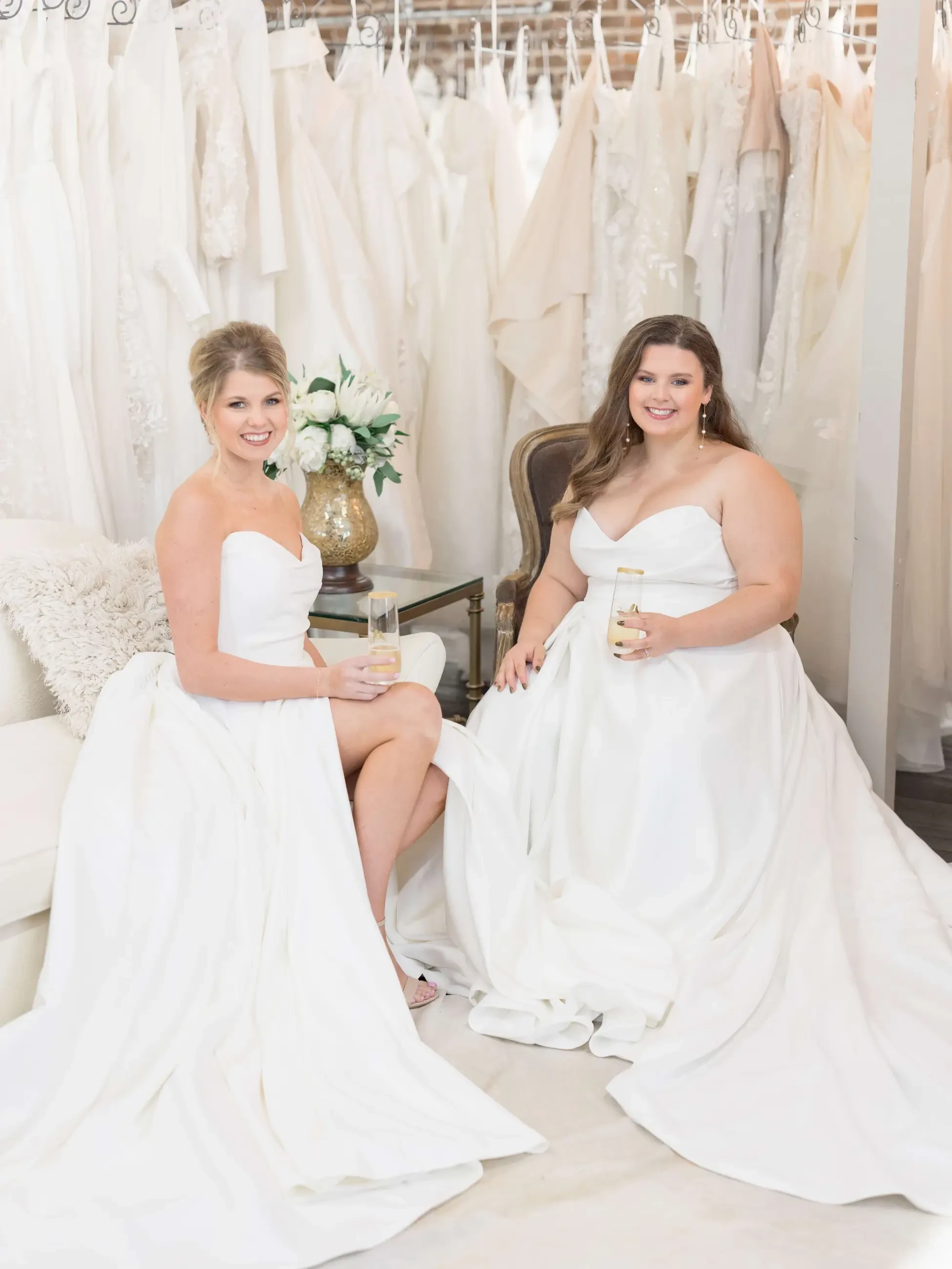 Models wearing a white wedding dresses