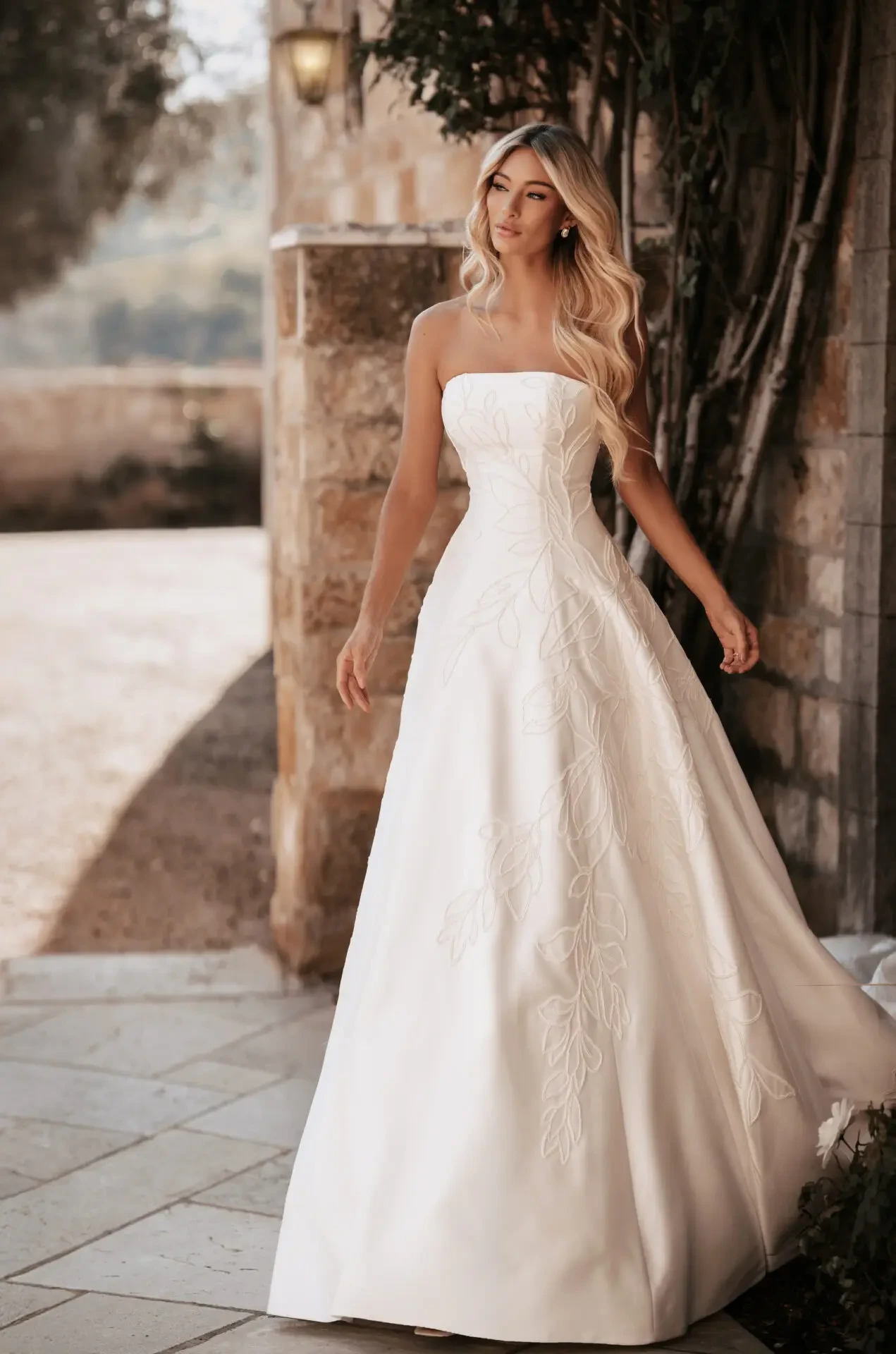 model wearing Madi Lane wedding gown